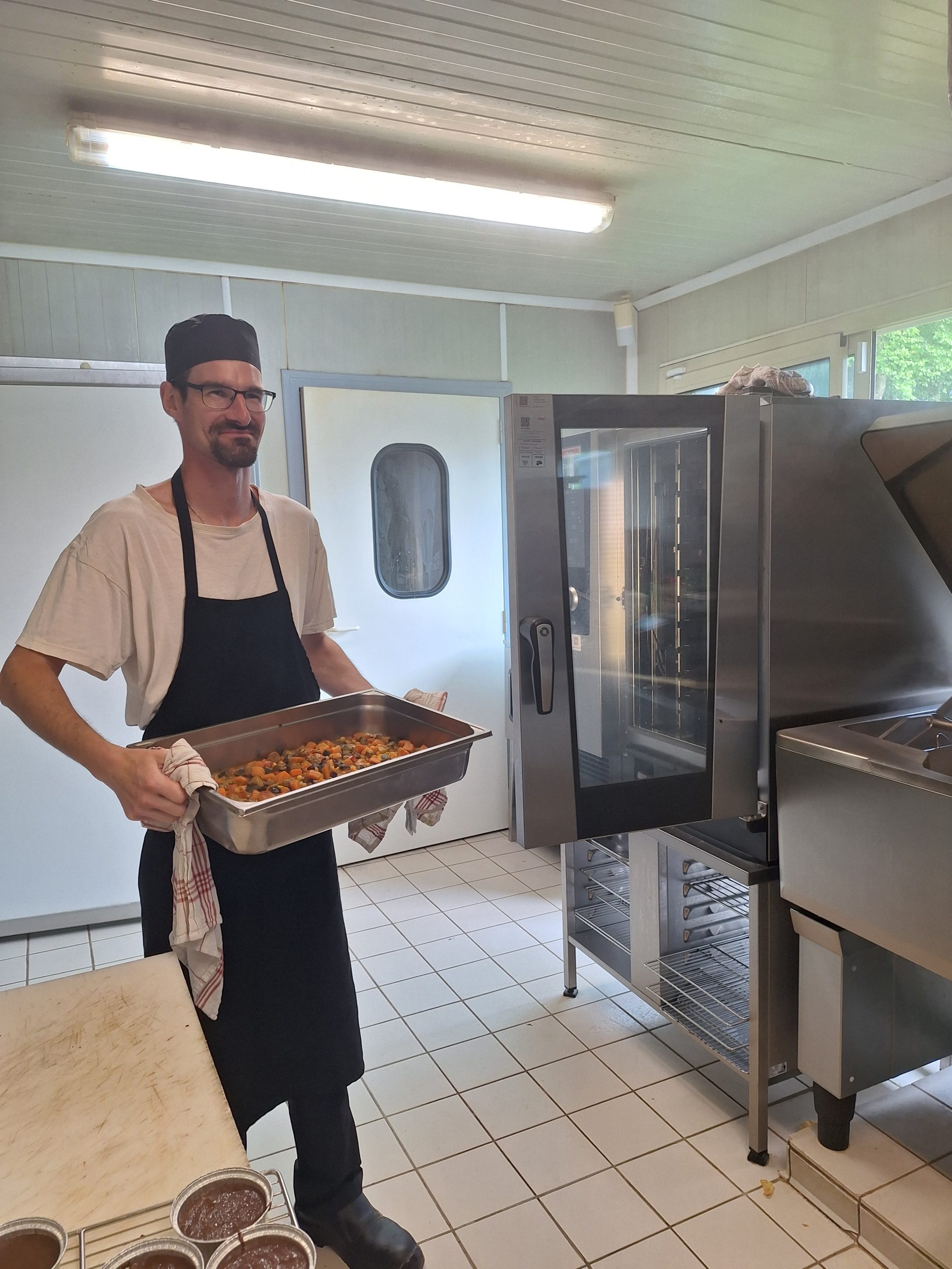 La préparation des repas par les cuisiniers